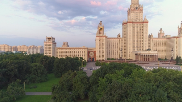 Moscow State University in Summer. Russia. Flying From Trees To Panoramic View. Aerial View alt