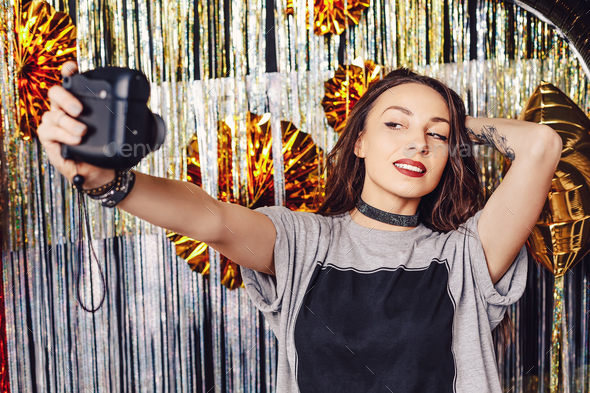 Woman taking a photo - Stock Photo - Images