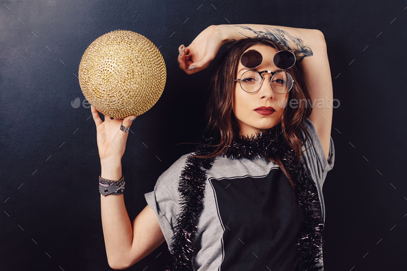Portrait of seductive hipster girl wearing glasses - Stock Photo - Images