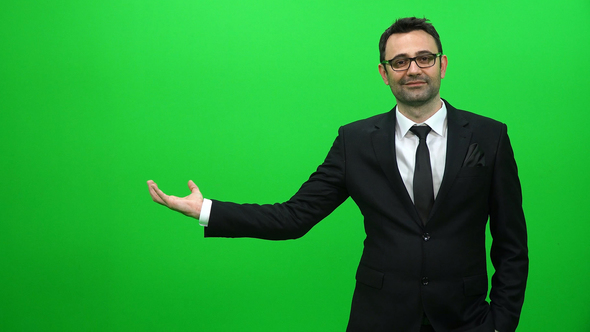 Businessman Lifting Or Presenting Something on Green Screen. Right Side