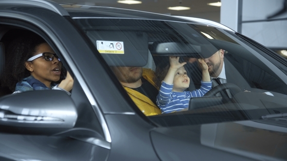 Diverse Couple Exploring New Car, Stock Footage | VideoHive