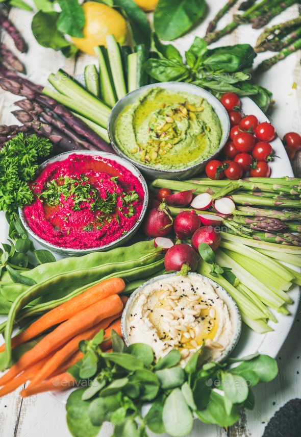 Healthy raw summer vegan snack plate for vegetarian party - Stock Photo - Images