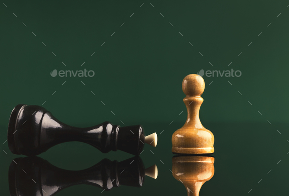 White pawn has got victory under black queen - Stock Photo - Images