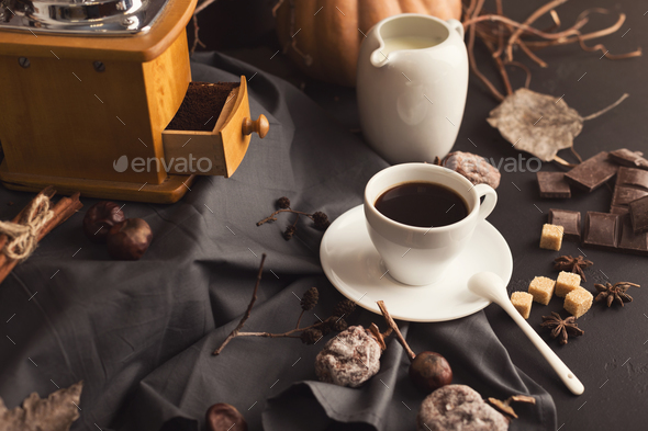 Coffee cup and sweets on vintage wooden table - Stock Photo - Images