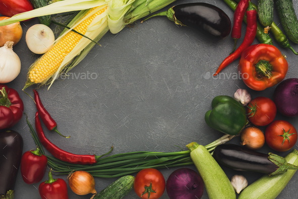 Frame of fresh vegetables on grey background with copy space - Stock Photo - Images