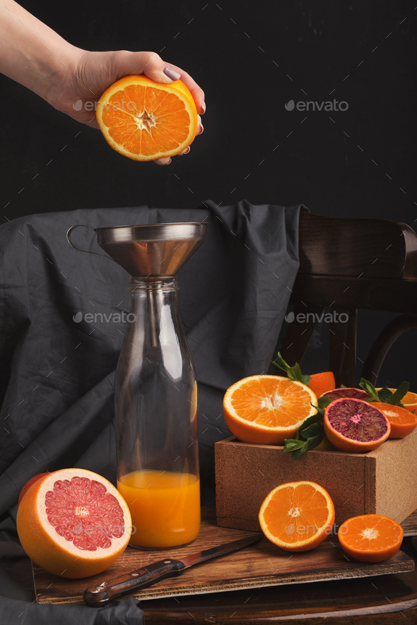 Preparing citrus fresh on black old chair - Stock Photo - Images