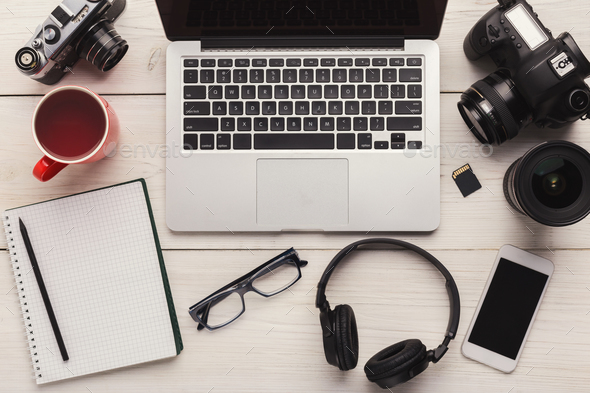 Photographer equipment and blank notepad - Stock Photo - Images