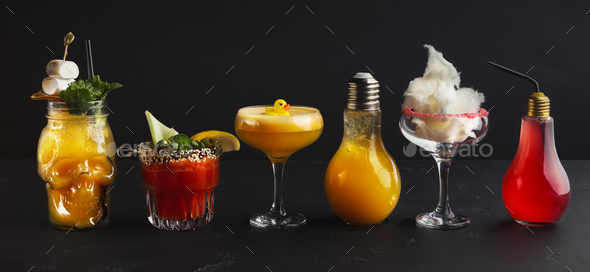 Variety of creative cocktails on black background - Stock Photo - Images