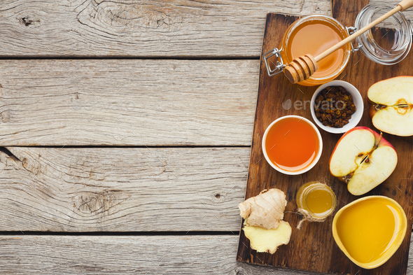 Various types of honey on wooden background, top view - Stock Photo - Images