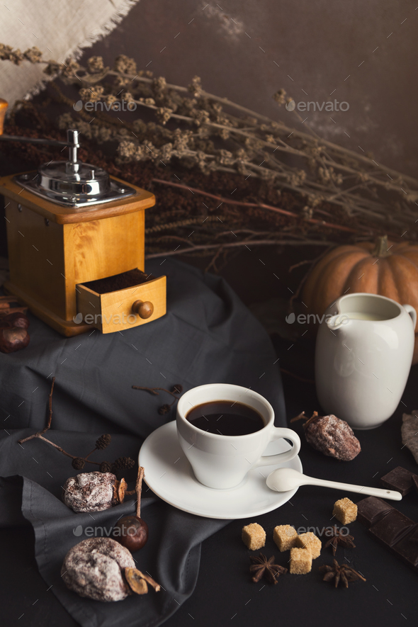 Coffee cup and sweets on vintage wooden table - Stock Photo - Images