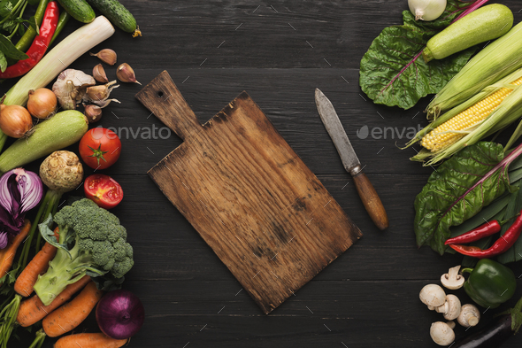 Fresh organic vegetables on wood background. - Stock Photo - Images