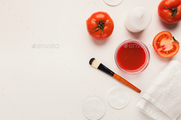 Handmade tomato face mask for home skin care - Stock Photo - Images