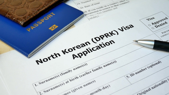North Korean DPRK Visa Application Form with Passport and Pen alt
