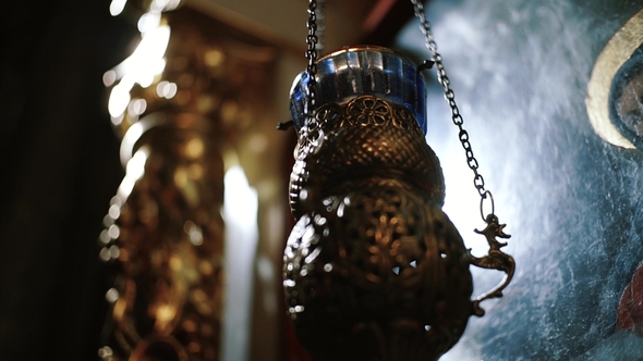 View at the Church Candles in Sun Rays in the Temple alt