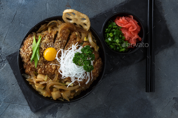 Rice bowl topped with fried pork cutlet Katsudon, tonkatsu donburi, japanese cuisine - Stock Photo - Images