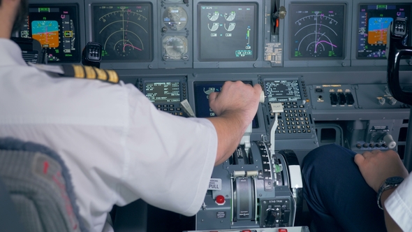 Pilot's Hand Is Located on a Throttle Lever in an Aircraft Cockpit ...