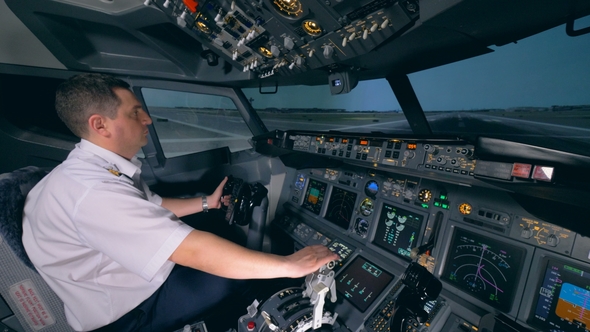 A Flight Simulator Is Demonstrating Taking-off Process Under Instructor's Control alt