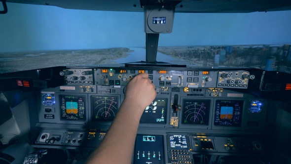 Flight Instructor and His Trainee Are Practicing Taking Off in a Flight Simulator alt