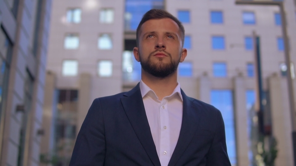 Caucasian Young Man Walk in City alt