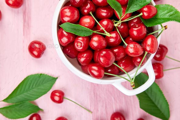 Red cherry in white bowl - Stock Photo - Images
