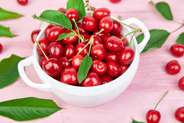 Red cherry in white bowl - Stock Photo - Images