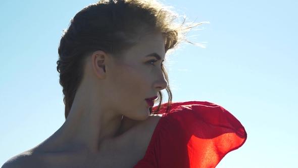 Portrait of a Young Woman in the Sunlight in Profile