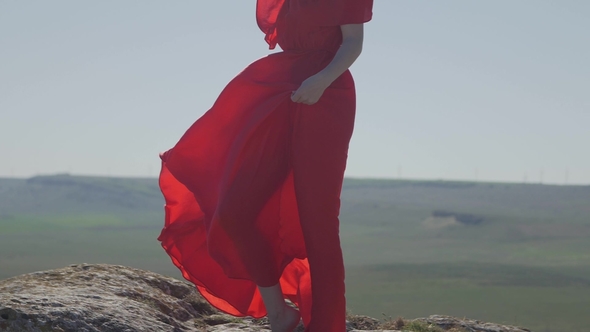 Luxurious Barefoot Woman on the Background of the Horizon alt