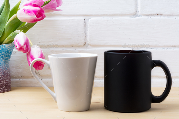 Download Black Coffee Cup And White Latte Mug Mockup With Magenta Tulip Stock Photo By Tasipas