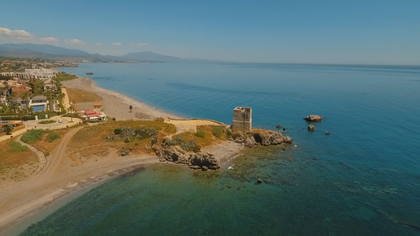 Drone View of Mediterranean Coast with Historic Fortress