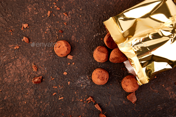 Chocolate Candy truffles fall out - Stock Photo - Images