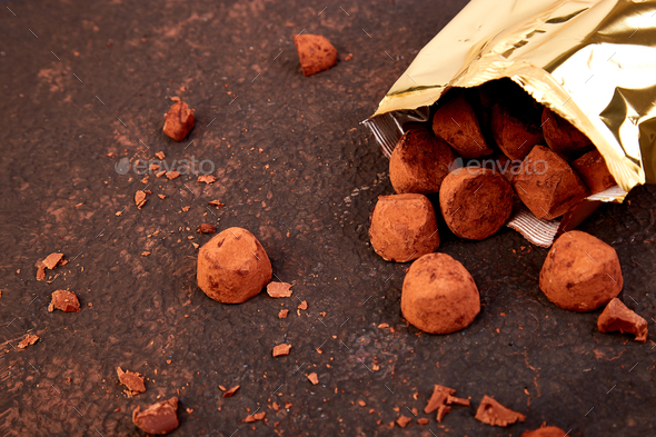 Chocolate Candy truffles fall out - Stock Photo - Images