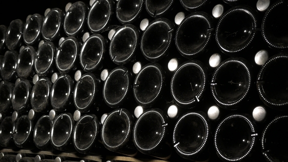 Production of Sparkling Wine of Champagne . Old Wine Cellars a Warehouse with Bottles alt