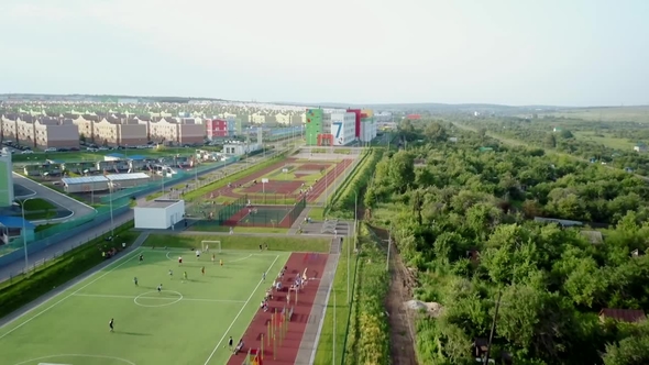 Camera Is Flying Over Sports Areas, Children Playgrounds and Schools Zone in New City District