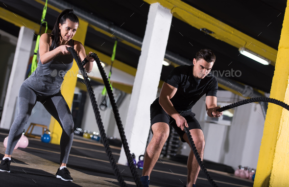 Sports Couple Doing Battle Ropes Cross Fitness Exercise Stock Photo By