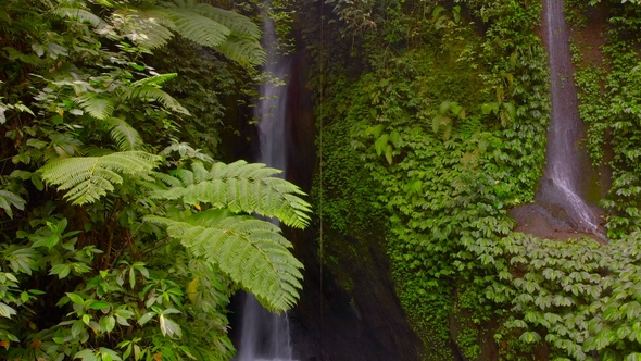 Aerial View of the Leke Leke Waterfall in Jungles of Bali, Indonesia alt