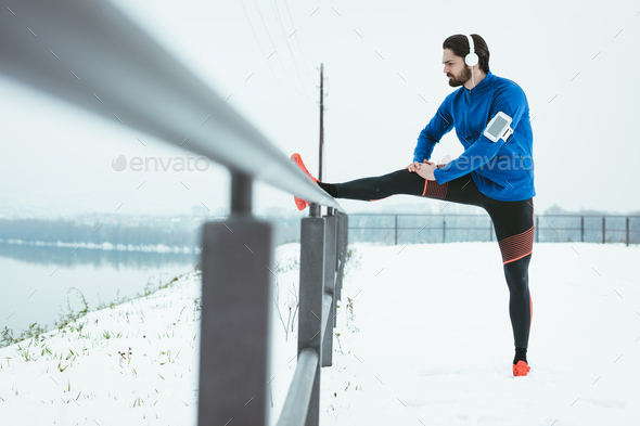Stretching In Cold - Stock Photo - Images