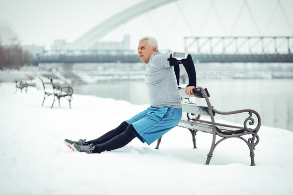 Stretching On The Bench - Stock Photo - Images