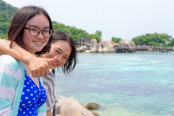 Daughter and mother at the sea - Stock Photo - Images