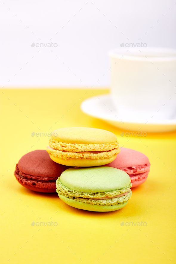 Sweet Dessert Macaron or macaroon with coffee - Stock Photo - Images