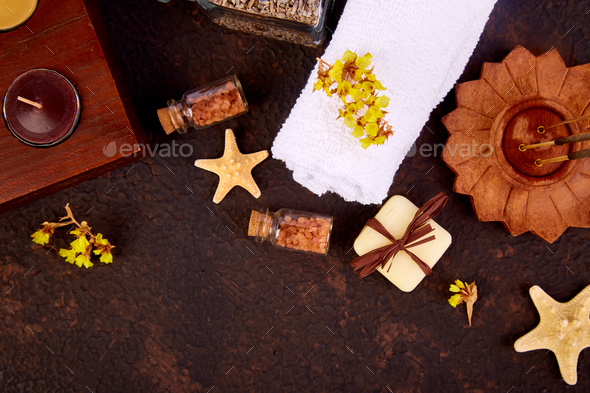 Spa concept. Aromatic candles, towel - Stock Photo - Images
