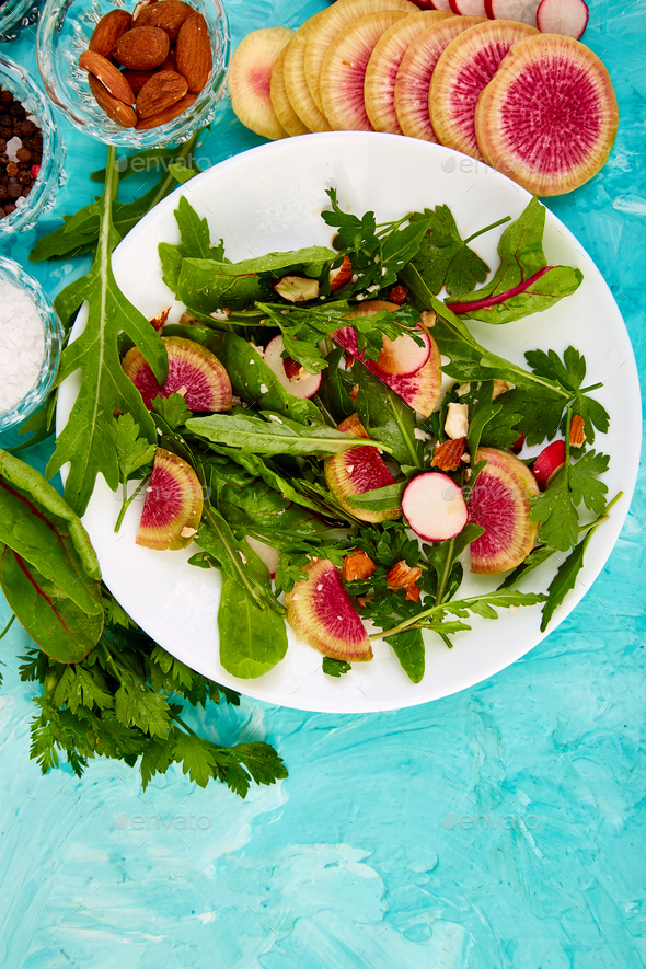 Salad in white plate around Ingredient - Stock Photo - Images