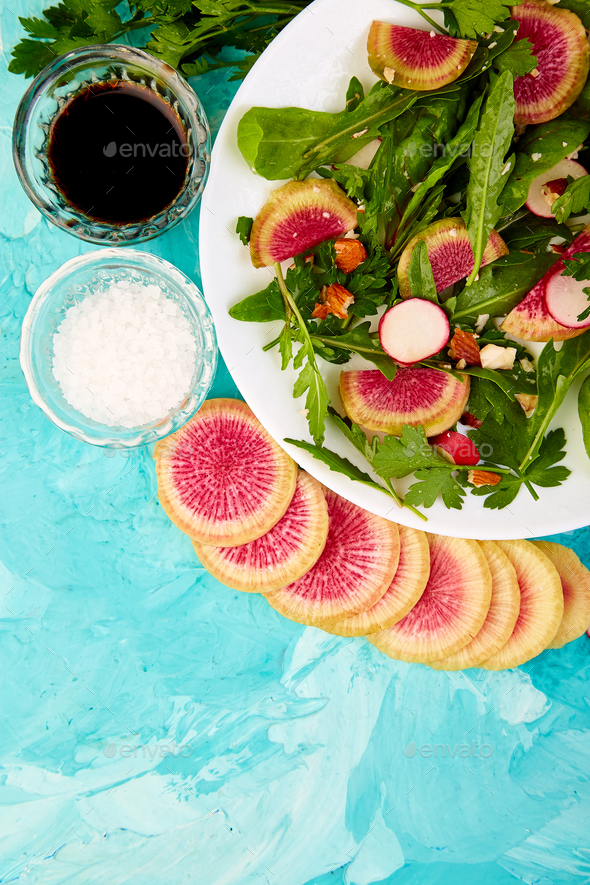 Salad in white plate around Ingredient - Stock Photo - Images