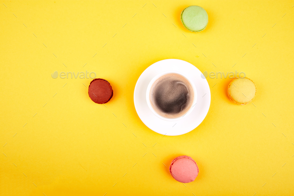 Sweet Dessert Macaron or macaroon with coffee - Stock Photo - Images