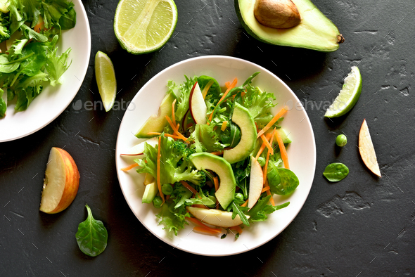 Salad with avocado, green pea, greens, apple - Stock Photo - Images