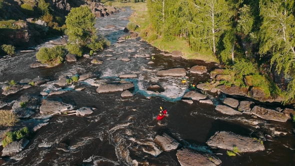 Overhead Aerial Shot of Rafting Boat on Raging Mountain River with Rapids