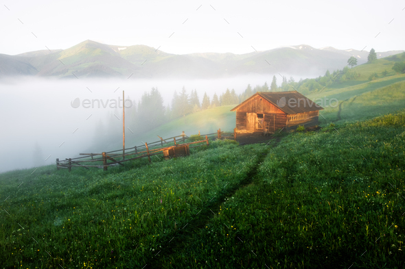Alone house on foggy meadow Stock Photo by ivankmit | PhotoDune