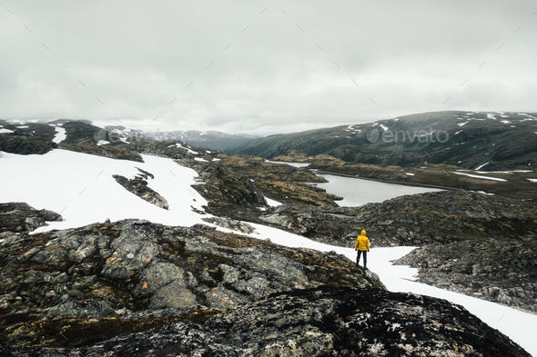 Typical norwegian landscape with snowy mountains - Stock Photo - Images