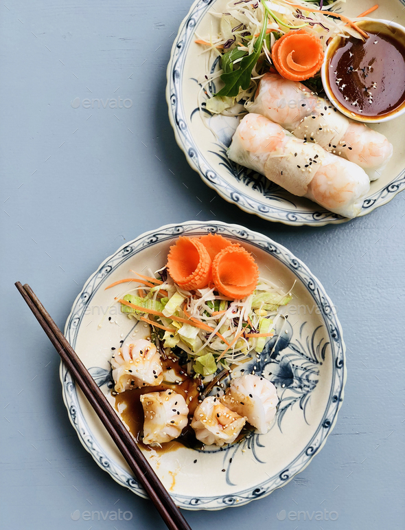 Dim sum dumplings and summer rice paper rolls - Stock Photo - Images