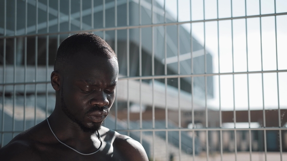 Black Tired African American Male Athlete After Hard Training Drinking Clean Cool Water