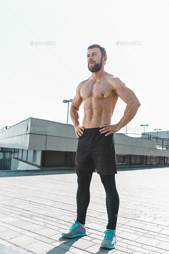 Fit fitness man posing at city - Stock Photo - Images
